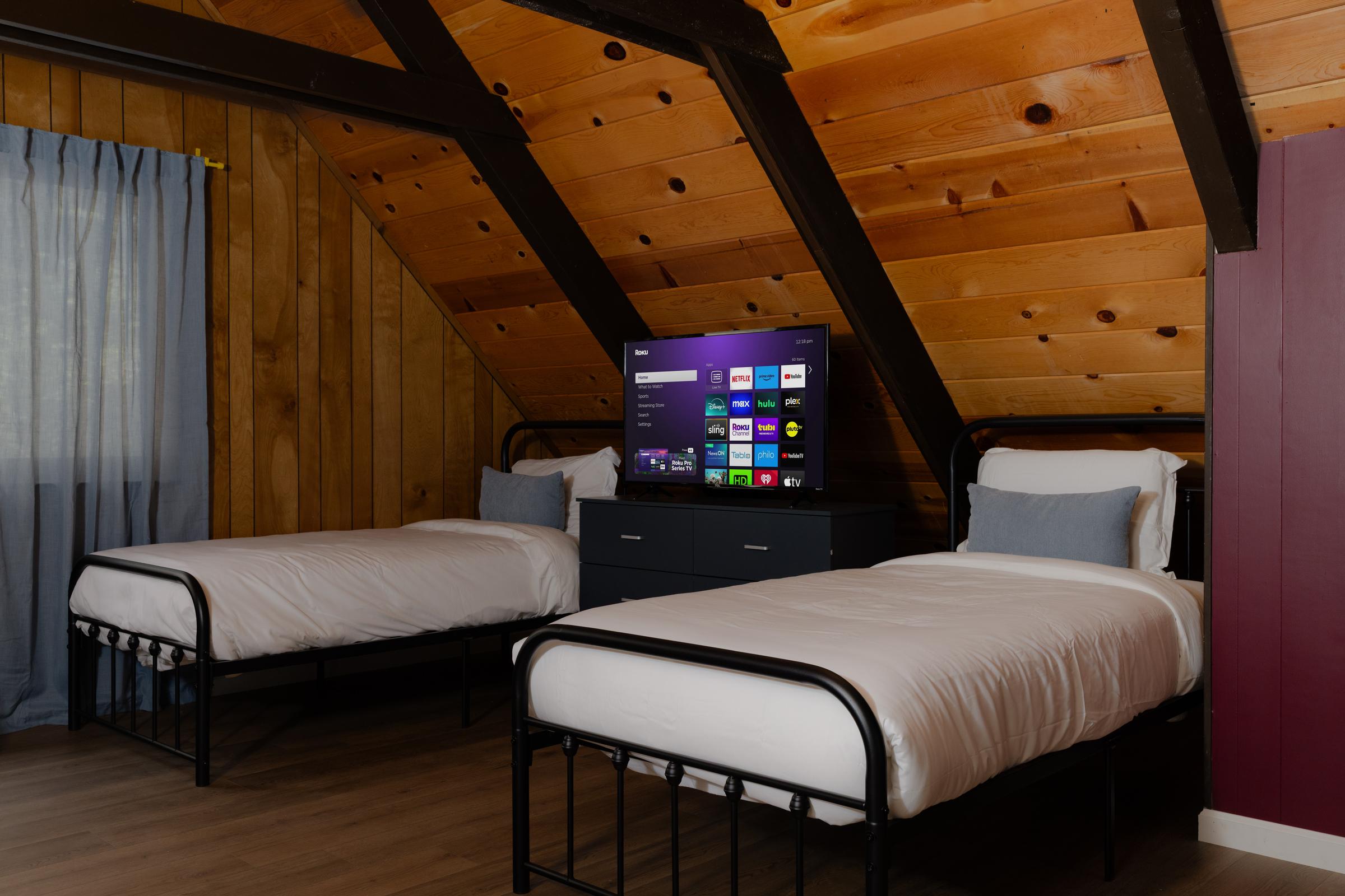 Loft twin beds and TV